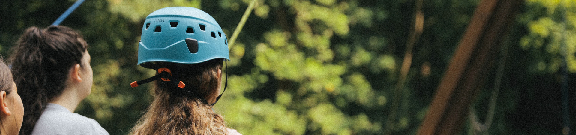  Girl Scout wearing helmet at alpine tower 