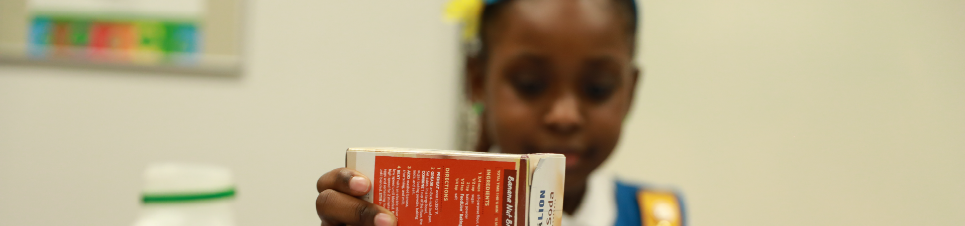  Girl uses baking. soda to conduct a science experiment 