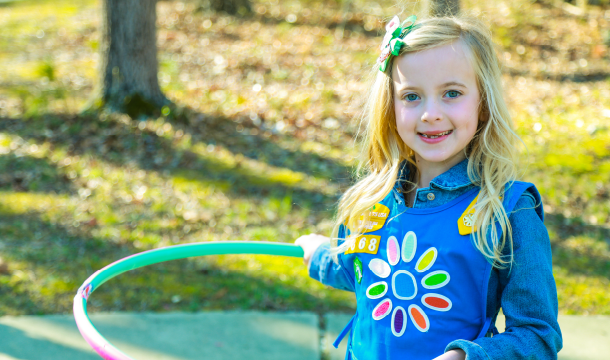 Girl Scout with hula hoop