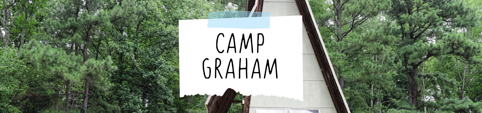  outdoor area near lake with Camp Graham graphic text 